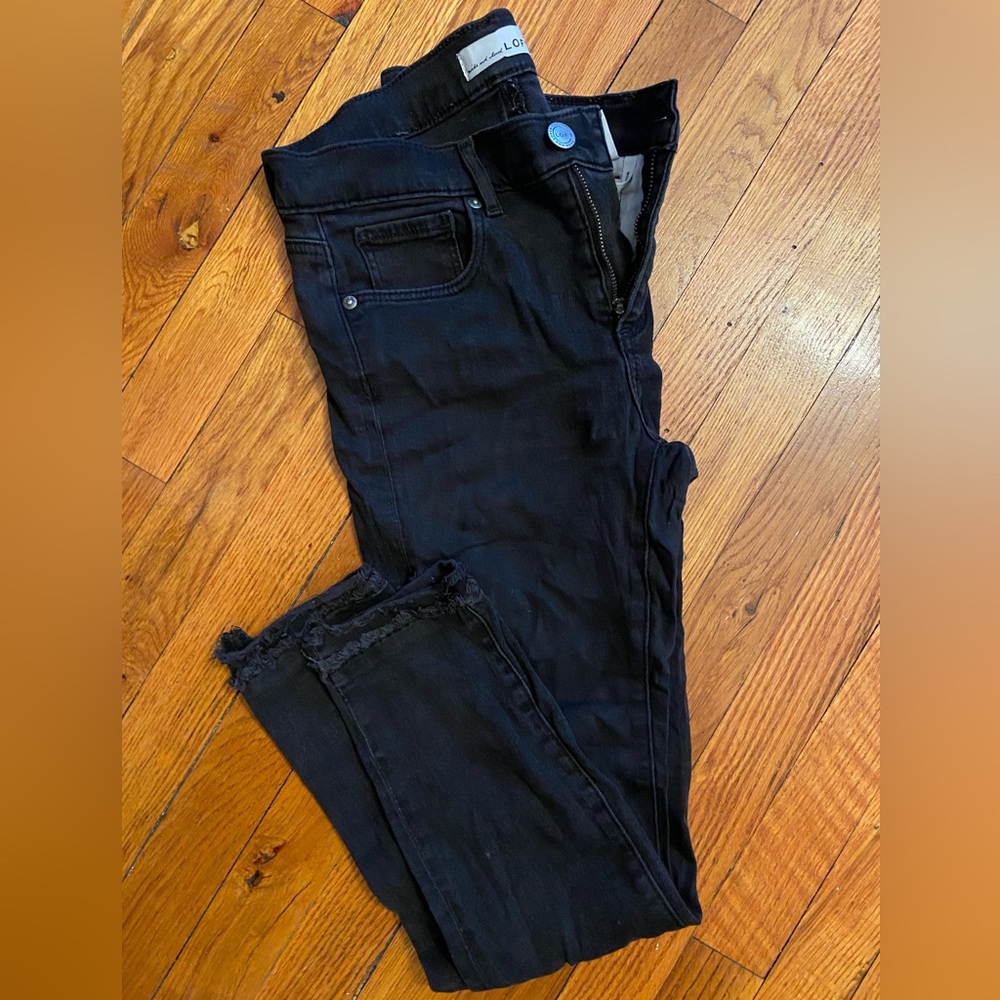 Loft black skinny jeans, fringe ends